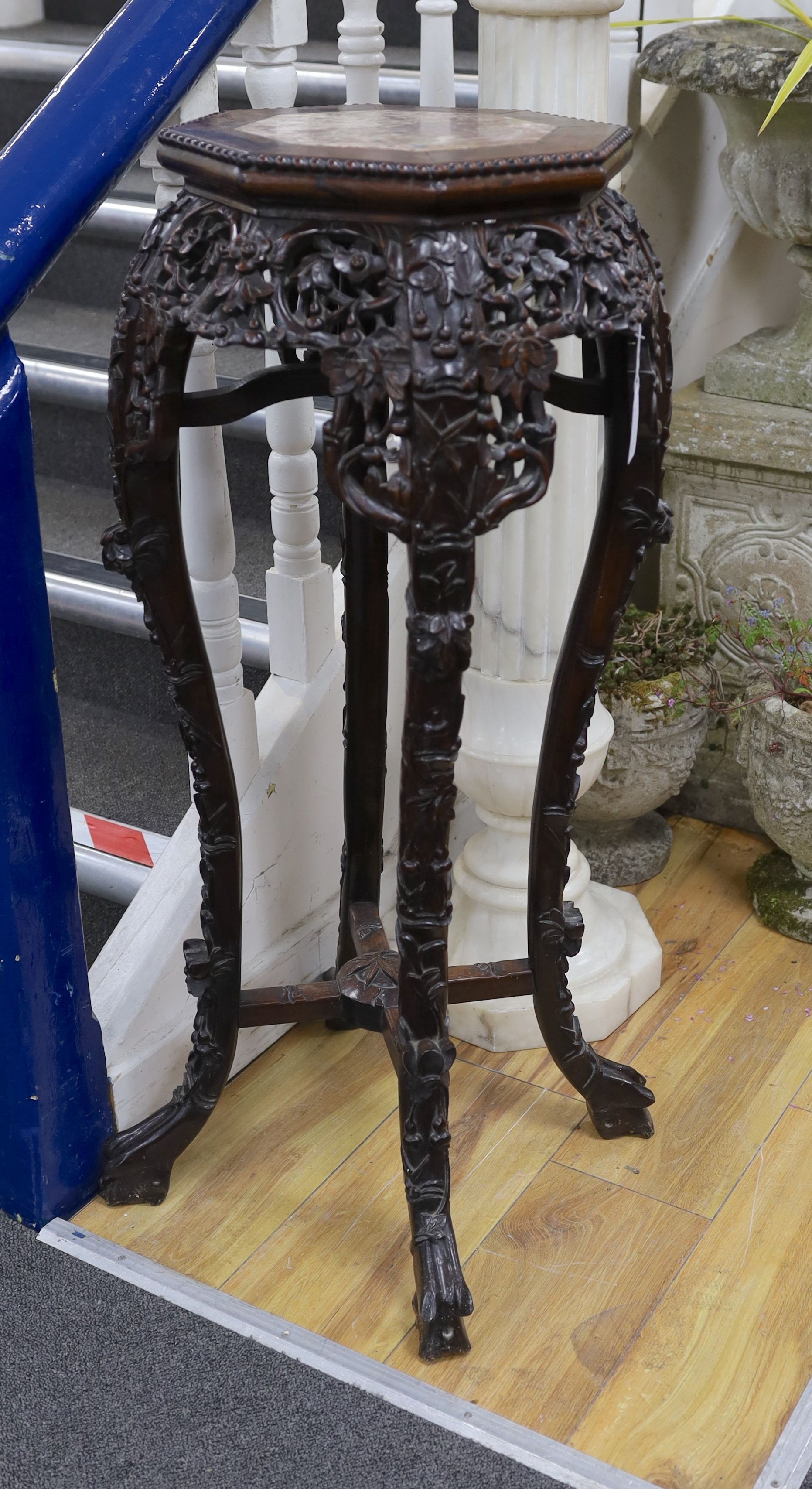 A Chinese hongmu marble topped jardiniere stand, early 20th century, height 90cm